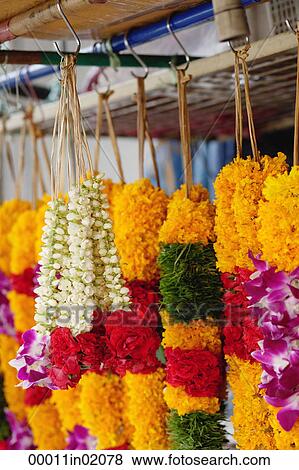 Brightly coloured flower garlands View Large Photo Image Stock Photo - Brightly coloured flower garlands. Fotosearch