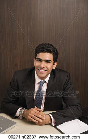 Businessman smiling at camera View Large Photo Image Stock Photo - Businessman smiling at camera. Fotosearch