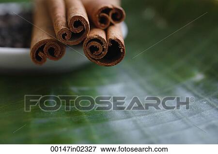 Close-up of cinnamon sticks View Large Photo Image Stock Photo - Close-up of cinnamon sticks. Fotosearch