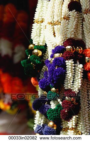 Stock Image - Hanging flower garlands. Fotosearch