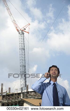 Man on mobile phone View Large Photo Image Stock Image - Man on mobile phone. Fotosearch