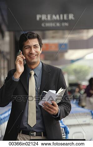 Man talking on the phone View Large Photo Image Picture - Man talking on the phone. Fotosearch