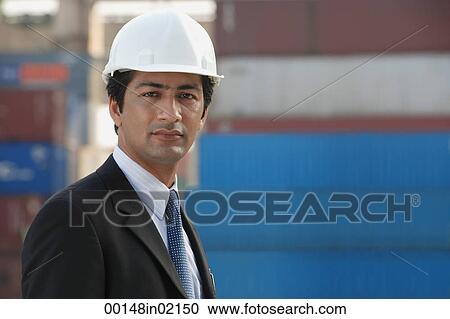 Man with helmet looking at camera View Large Photo Image Stock Image - Man with helmet looking at camera. Fotosearch