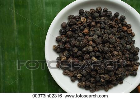 Still life of black pepper View Large Photo Image Stock Photograph - Still life of black pepper. Fotosearch