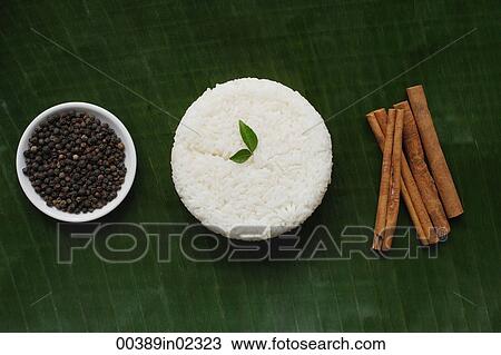 Still life of cinnamon sticks, black pepper and basmati rice View Large Photo Image Stock Image - Still life of cinnamon sticks, black pepper and basmati rice. Fotosearch