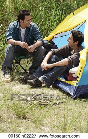 Stock Photo - Two friends out camping. Fotosearch