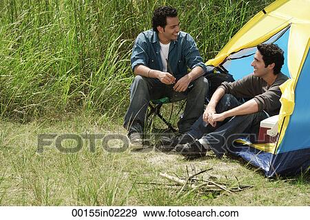 Stock Photo - Two friends out camping. Fotosearch