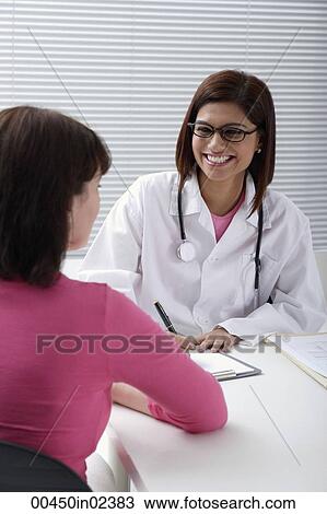 Doctor with patient View Large Photo Image Stock Image - Doctor with patient. Fotosearch