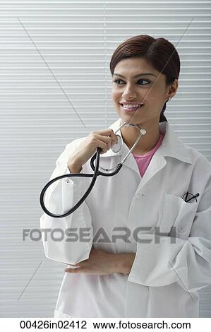 Doctor with stethoscope View Large Photo Image Stock Image - Doctor with stethoscope. Fotosearch