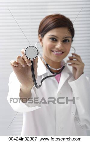Doctor with stethoscope View Large Photo Image Stock Photo - Doctor with stethoscope. Fotosearch