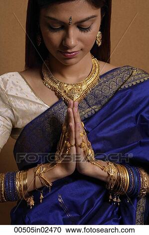 Indian woman wearing traditional wedding jewelry View Large Photo Image Stock Image - Indian woman wearing traditional wedding jewelry. Fotosearch