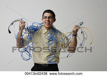 Man with cords and wires around his neck View Large Photo Image Stock Photo - Man with cords and wires around his neck. Fotosearch