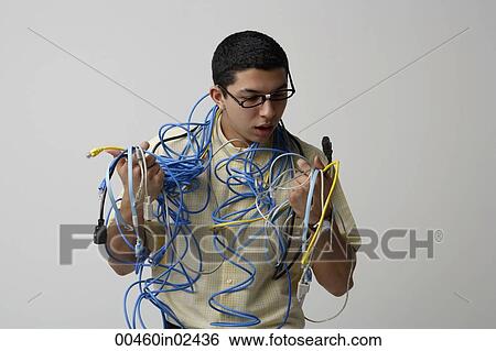 Man with cords and wires around his neck View Large Photo Image Stock Photograph - Man with cords and wires around his neck. Fotosearch