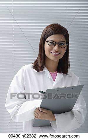 Smiling doctor or scientist View Large Photo Image Stock Image - Smiling doctor or scientist. Fotosearch