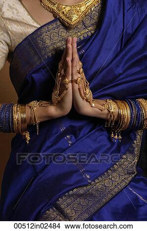 Picture - Torso of Indian woman wearing sari and jewelry. Fotosearch