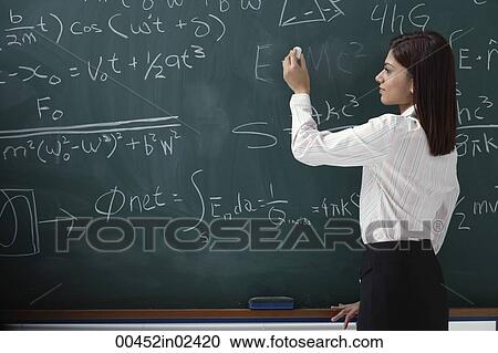 Woman writing equations on chalk board View Large Photo Image Stock Image - Woman writing equations on chalk board. Fotosearch