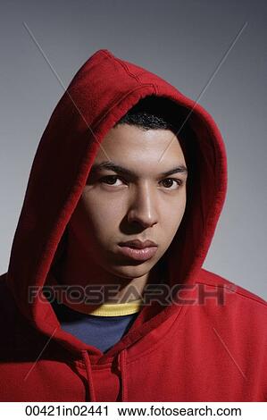 young man wearing red hooded sweatshirt View Large Photo Image Stock Image - young man wearing red hooded sweatshirt. Fotosearch
