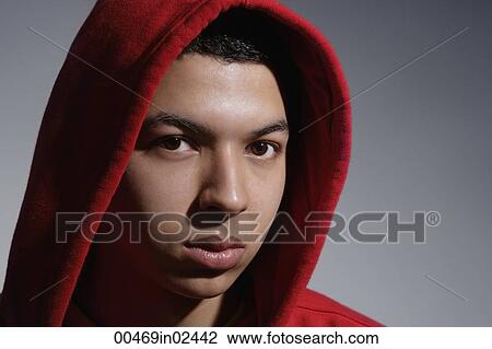 young man wearing red hooded sweatshirt View Large Photo Image Stock Image - young man wearing red hooded sweatshirt. Fotosearch