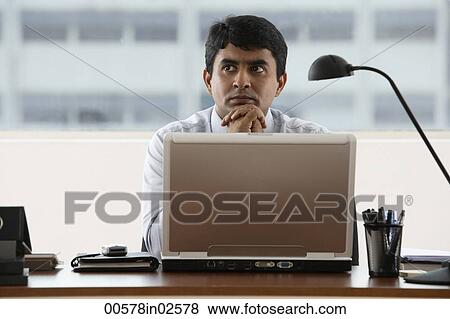 business man, hands propping chin, thinking View Large Photo Image Stock Photo - business man, hands propping chin, thinking. Fotosearch