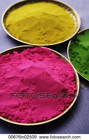 pink, yellow and green Indian powder paints closeup View Large Photo Image Stock Photo - pink, yellow and green Indian powder paints closeup. Fotosearch