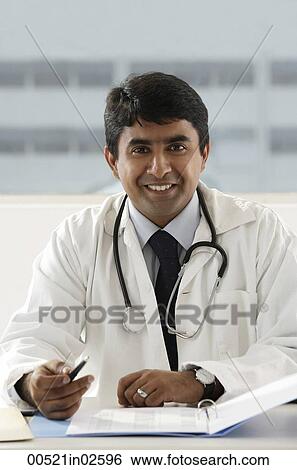 portrait of smiling doctor View Large Photo Image Stock Photograph - portrait of smiling doctor. Fotosearch