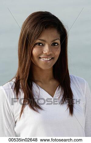 Stock Photo - Portrait of woman, smiling. Fotosearch