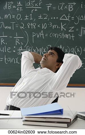 teacher leaning back in his chair View Large Photo Image Stock Photo - teacher leaning back in his chair. Fotosearch
