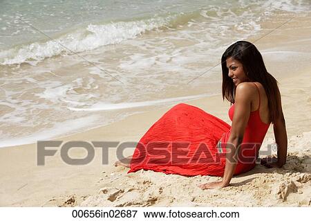 woman lying on beach View Large Photo Image Stock Photo - woman lying on beach. Fotosearch