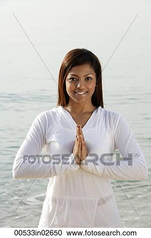 woman practicing yoga at the beach View Large Photo Image Stock Image - woman practicing yoga at the beach. Fotosearch