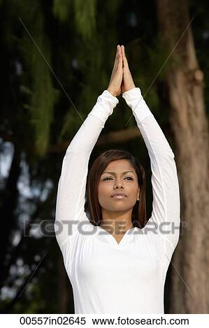 woman practicing yoga outside View Large Photo Image Stock Photography - woman practicing yoga outside. Fotosearch
