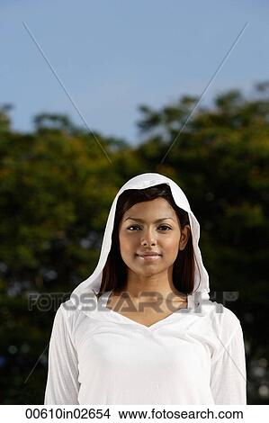 woman wearing hooded sweater View Large Photo Image Picture - woman wearing hooded sweater. Fotosearch