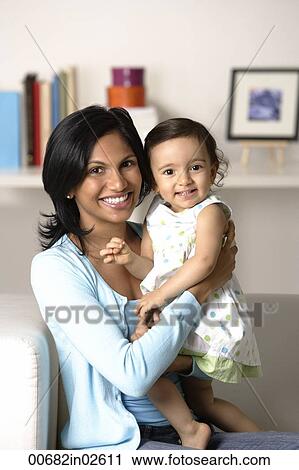woman with baby, both smiling View Large Photo Image Stock Image - woman with baby, both smiling. Fotosearch