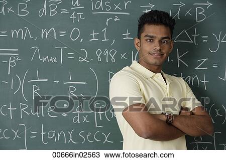 young man standing proudly in front of chalkboard View Large Photo Image Stock Image - young man standing proudly in front of chalkboard. Fotosearch