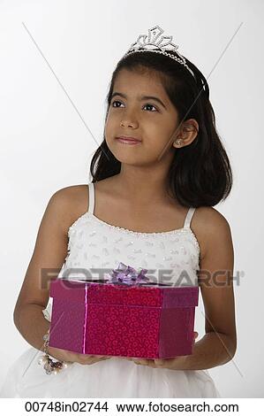 girl holding gift View Large Photo Image Picture - girl holding gift. Fotosearch