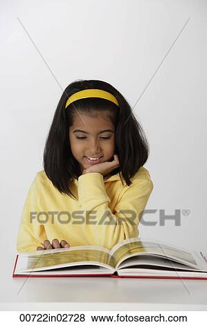 Stock Photo - girl reading book. Fotosearch