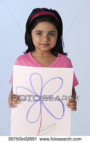 Stock Image - Little girl holding picture of flower. Fotosearch