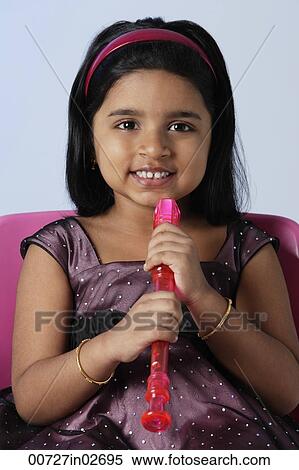 Little holding recorder/flute View Large Photo Image Stock Photography - Little holding recorder/flute. Fotosearch