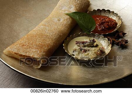 dosai with two curries on silver plate View Large Photo Image Stock Image - dosai with two curries on silver plate. Fotosearch
