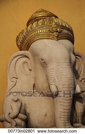 Stock Image - Elephant God, Ganesh with gold turban.. Fotosearch