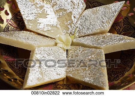 Indian sweets with silver topping. View Large Photo Image Stock Image - Indian sweets with silver topping.. Fotosearch