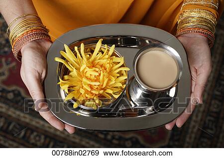 tight shot of woman holding a tray with tea. View Large Photo Image Stock Photo - tight shot of woman holding a tray with tea.. Fotosearch