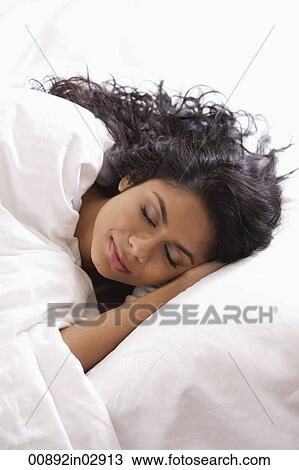 Head shot of Indian woman sleeping in bed View Large Photo Image Stock Image - Head shot of Indian woman sleeping in bed. Fotosearch