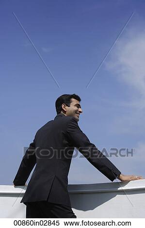Indian businessman looking at view. View Large Photo Image Stock Photography - Indian businessman looking at view.. Fotosearch
