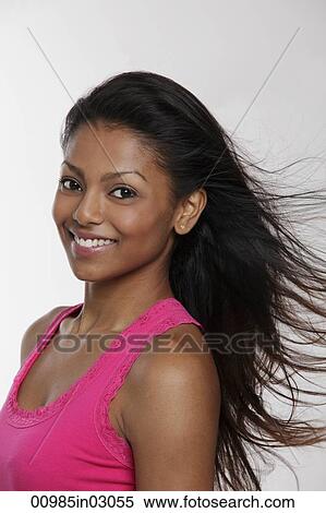 Head shot of smiling Indian woman with long hair View Large Photo Image Stock Photography - Head shot of smiling Indian woman with long hair. Fotosearch