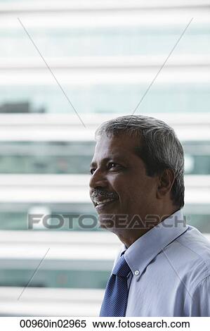 Profile of Indian man looking up View Large Photo Image Stock Photography - Profile of Indian man looking up. Fotosearch