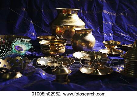 Still life of Indian brass bowls and cups on table View Large Photo Image Stock Image - Still life of Indian brass bowls and cups on table. Fotosearch