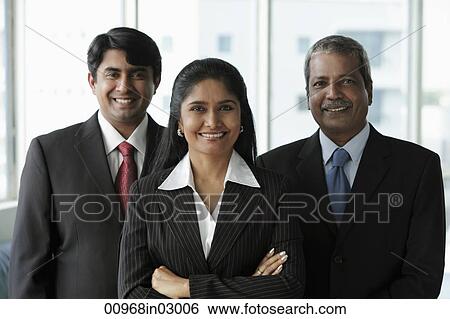 Three Indian people dressed in business suits and smiling View Large Photo Image Stock Photograph - Three Indian people dressed in business suits and smiling. Fotosearch