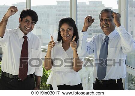 Three Indian people smiling making hand gestures View Large Photo Image Stock Photo - Three Indian people smiling making hand gestures. Fotosearch