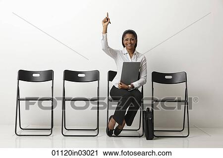 Young Indian woman raises her hand. View Large Photo Image Stock Image - Young Indian woman raises her hand.. Fotosearch