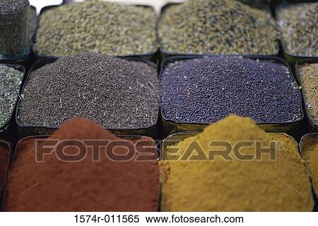 Assorted spices in containers at a market View Large Photo Image Stock Photography - Assorted spices in containers at a market. Fotosearch